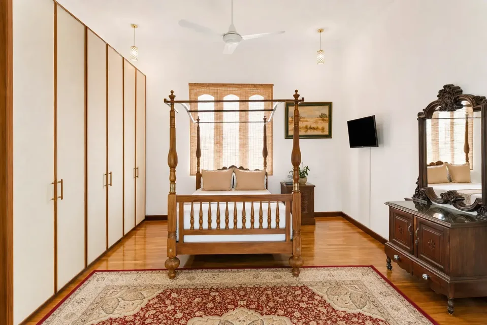 Front view of the Transit Double Room bed and wardrobe