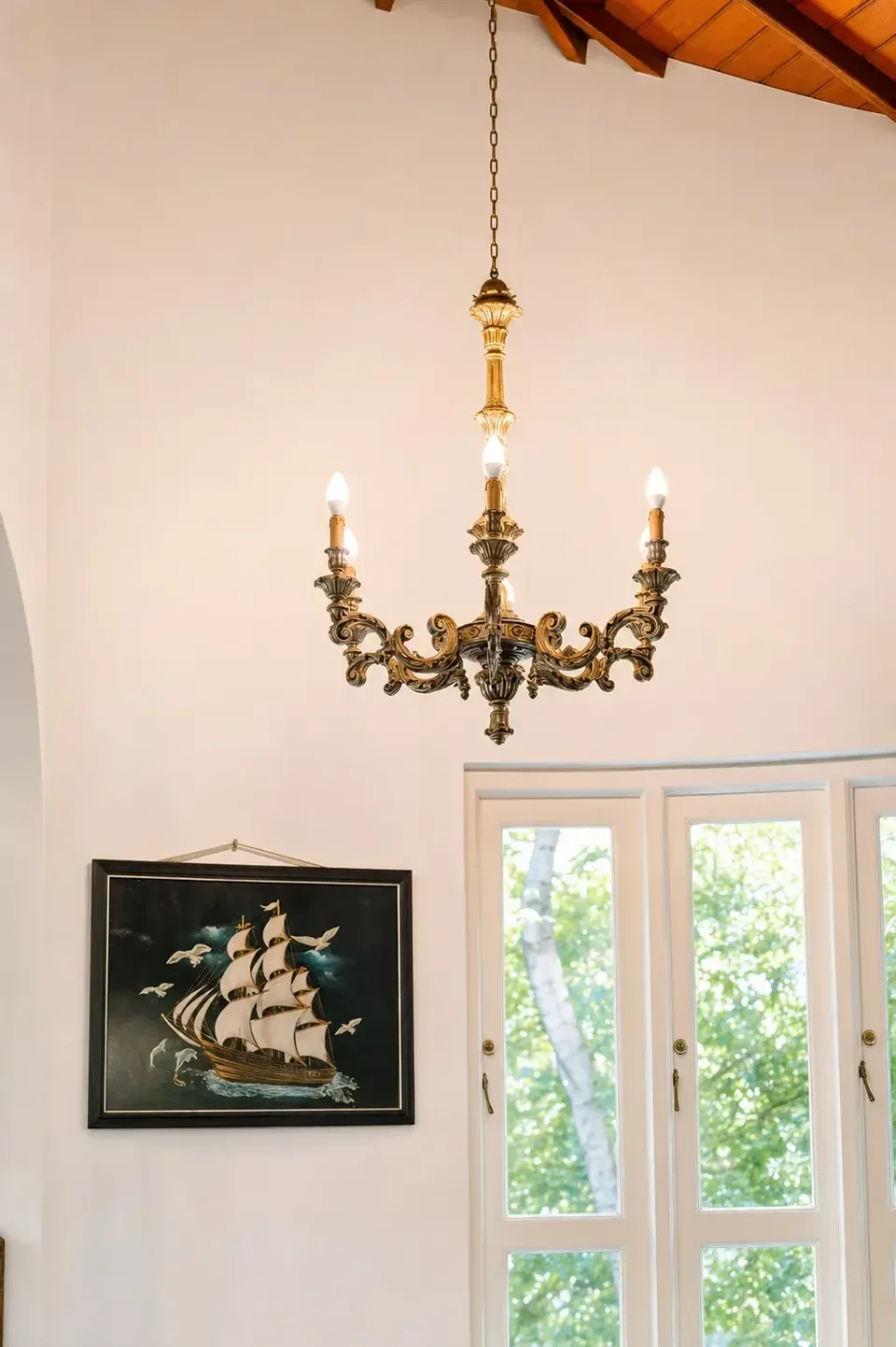 Chandelier and tall window in the Negombo villa