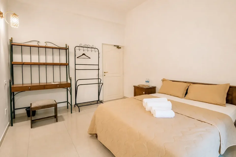 Comfort Double Room bed and open shelving